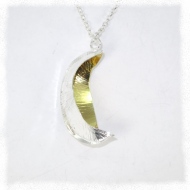 Silver fold formed boat pendant with gold plating